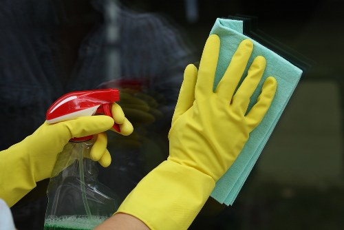 Local window cleaning service reaching upper windows safely in Uxbridge