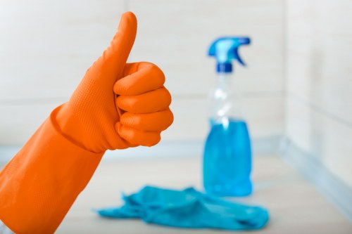 Cleaner preparing a Uxbridge flat for move in with thorough room-by-room cleaning