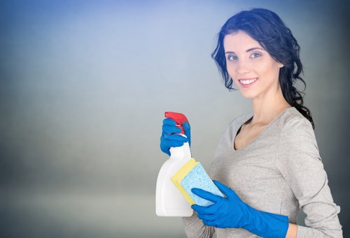 Cleaner maintaining a shared staircase and landing area